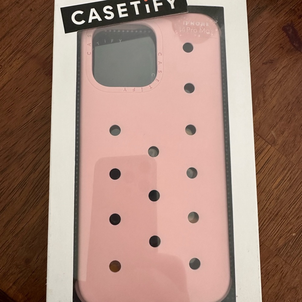 Casetify IPhone 14 Pro Max pushin case with diner charms pink